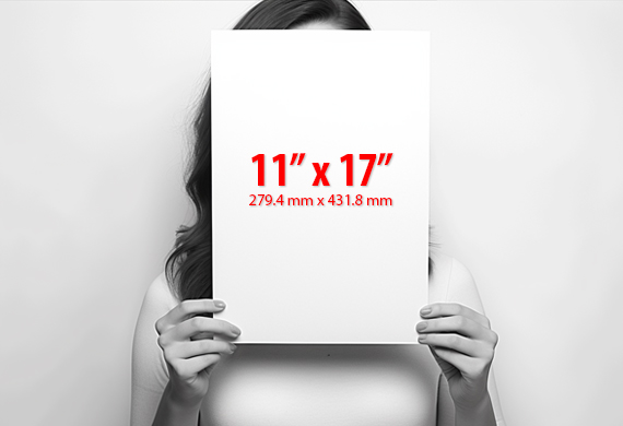 woman holding an 11 x 17 inch small poster