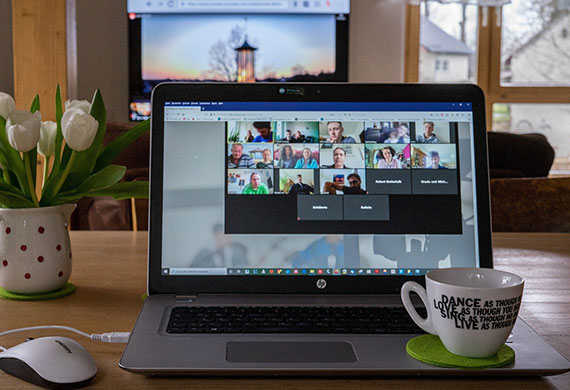 Attend online meetings and stay connected with coworkers when working from home