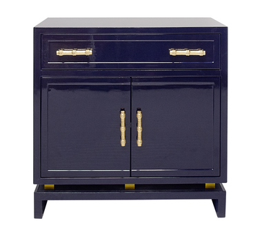 NAVY LACQUER (1) DRAWER, 2 DOOR CABINET WITH GOLD LEAFED BAMBOO HARDWARE AND GOLD LEAFED METAL DETAIL ON BASE.