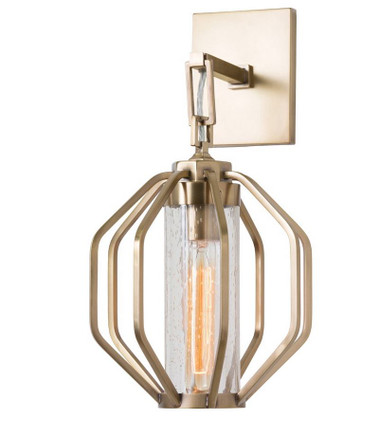 Playing off of the classic geometric hexagonal shape, this antique brass wall sconce is both classic and contemporary. The chunky chain link drop and smoke seedy glass insert add to the clean and modern appeal of this piece. This sconce would work beautifully in a library or bar, above a mirror in a powder room, or on either side of a furniture piece or mirror in a dining or breakfast room.