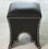 black leather ottoman/ stool with studs