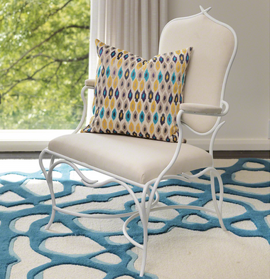 Global Views White Forest Chair is an upholstered arm chair with a white frame and white cushions