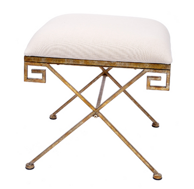 A gold greek key bench from Old World Design.