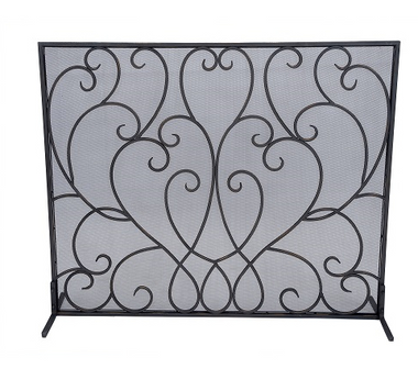 A bronze scroll fireplace screen from Old World design.