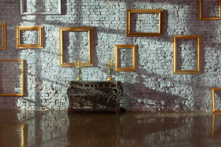 Gold Frames in a modern room
