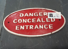 assorted cast iron signs