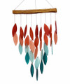 Waterfall wind chime presenting a cascade of hand cut, sandblasted, coral and turquoise ombre glass chimes suspended from a natural wood canopy.