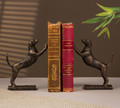 Stately hound bookends intricately cast of iron with a rich bronze finish.