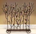 fire screen showcasing a small flock of birds perched on leafy branches.  artfully designed, this fire screen is crafted of iron with a rich bronze finish highlighted with antique gold patina birds and leaves.