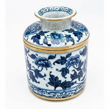 Hand painted porcelain tissue holder featuring a blue & white scrolling peony blossom motif set against a crackle finish background and accented with brass trim.
