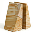Wedge shape marble bookends with beautiful striations in natural and sand-tone hues with a lustrous polished finish