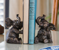 Trumpeting elephant bookends intricately cast of iron with a rich antique bronze patina
