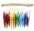 Rainbow wind chime showcasing a spectrum of colorful hand cut, sandblasted glass leaf shaped chimes suspended from a natural driftwood canopy.  