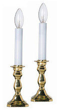 Brand new octagonal electric window candlestick lamps feature intricately cast solid brass bases with a lustrous brass patina.  Sold as a set of two.  Measures approximately 9 inches tall.