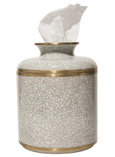Hand crafted porcelain tissue dispenser featuring a sophisticated crackle finish accented with brass trim. 