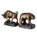 Bull and bear bookends intricately cast of metal with a bronze patina.