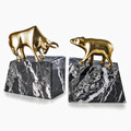 Our wall street bookends showcase a lacquered brass bull and bear atop black striated marble bases with a lustrous polished finish.