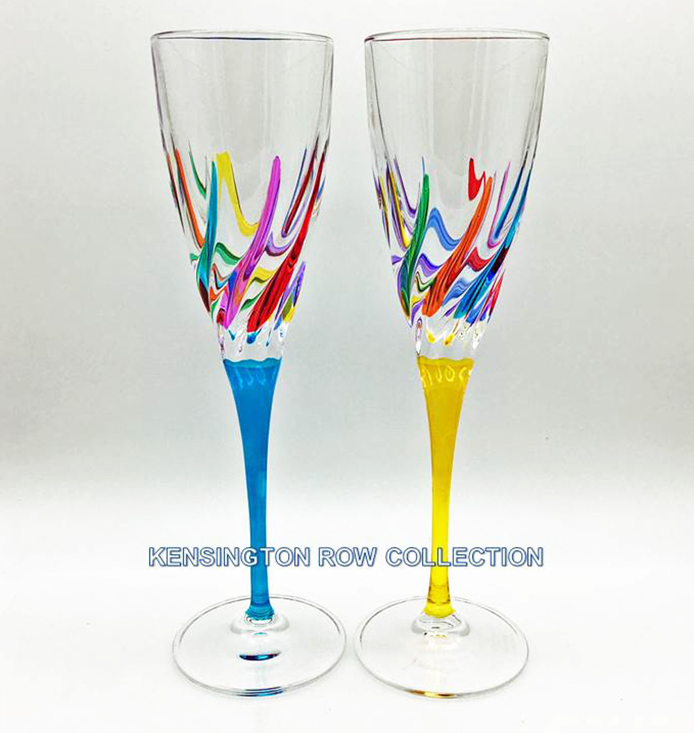 https://cdn2.bigcommerce.com/server5300/r2hjib/products/9034/images/16793/VA122-venetian-carnevale-champagne-flutes-set-of-two-yellow-and-turquoise__92360.1675719077.1280.1280.jpg?c=2