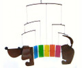 Dachshund wind chime.  The head and tail are constructed of powder coated metal.  The dachshund’s body is crafted of multicolor hand cut, sandblasted glass chimes.
