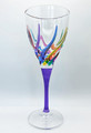 Brand new wine glass crafted in Italy of cut crystal and hand painted by master Venetian artisans.  This wine glass features a purple stem that supports a bowl beautifully hand painted in a rainbow of colors.