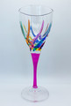 Brand new cut crystal wine glass crafted in Italy and hand painted by master Venetian artisans.  This wine glass features a fuchsia stem that supports a bowl beautifully hand painted in a rainbow of colors.