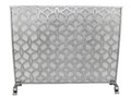 Brand new single panel fireplace screen showcases a complex geometric design of interlocking circles.  Crafted of iron & tole, with a multi-step finishing process. Features an antique silver patina and a protective wire mesh.