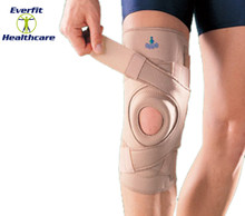 Four neoprene straps provide support directly to patella area.