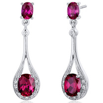 Glamorous 4.50 Carats Ruby Oval Cut Dangle Diamond CZ Earrings in Sterling Silver Style SE7934