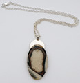 Fossil Walrus Ivory Slice Necklace | Robert Cutler's Bowls and Jewelry