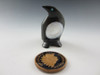 Penguin Fetish Carving from Black Marble by Zuni artist Calvert Bowanie available at Sacredbear.com.