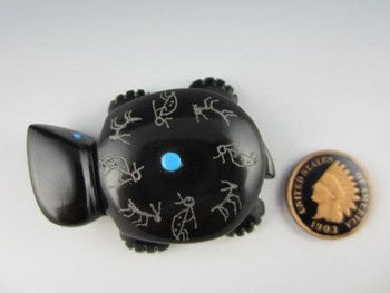 Turtle fetish carved from Black Marble by Zuni artist Reynold Lunasee available at Sacred Bear Jewelry.
