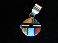 Sun pendant in Sterling by Navajo artist Edison Yazzie available at Sacred Bear Jewelry.