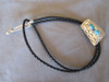 Bolo tie in Sterling bu Navajo artist Mike Thomas available from Sacred Bear Jewelry.