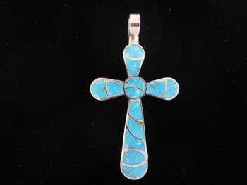 Cross Inlaid by Zuni artist Carmichael Haloo.