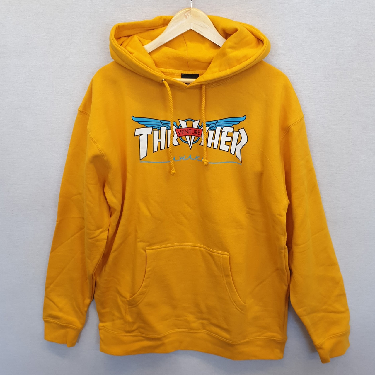 golden yellow sweatshirt