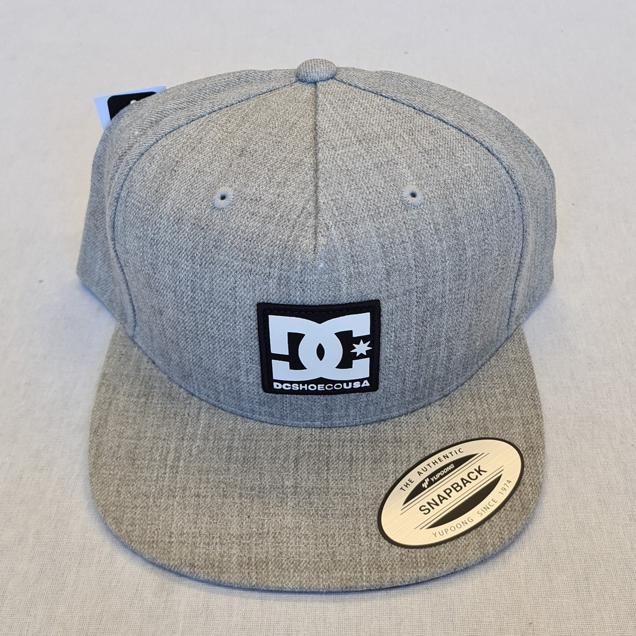 grey dc hat