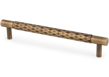 Antique brass cabinet pull handle with diamond cut detailing and solid brass construction