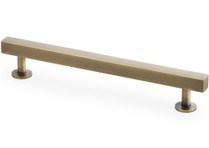 Antique brass square T-bar cupboard handle with clean square bar design and matching pedestal mounts.