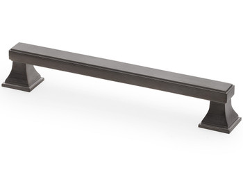 Dark bronze square pull handle by Alexander and Wilks with a decorative design on two square feet