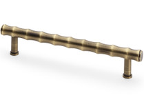 Antique brass bamboo-style cabinet pull handles with textured solid brass detailing