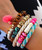 Coral Tassel, Blonde & Brown Beads 
Shown with Pink /Ivory Groovy Band
Coupled  with Pink & White Groovy Band