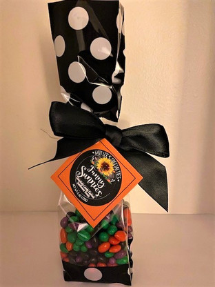 Fun and Festive! Halloween Funny Sunnie's are chocolate candy coated sunflower seeds in orange, black, purple and green colors. Adorably packaged in a happy polka dot bag and black satin ribbon makes a sweet gift for all! Perfect to brighten up gift baskets/boxes and add a festive touch to your shop shelves! Tasty too! :) 