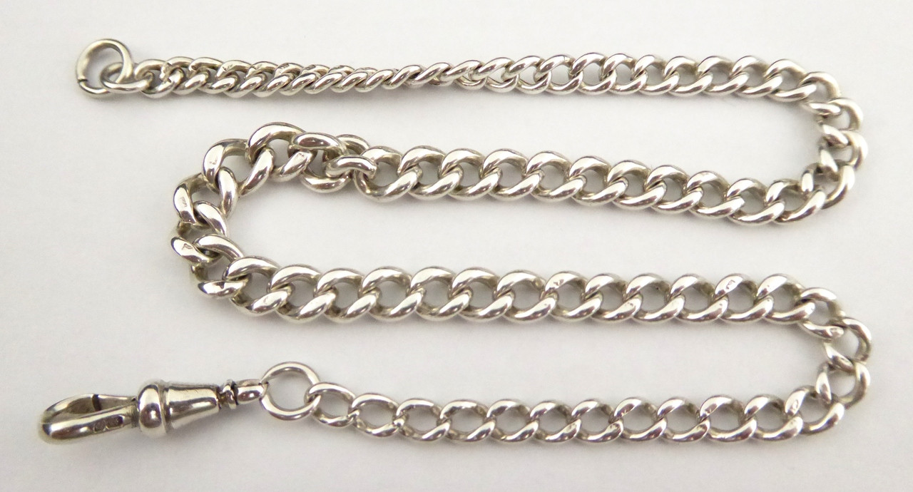 antique silver pocket watch and chain