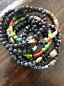 Assorted Beads 
Multi-African Trade Beads
Lava Beads with Buddha 
Black/Grey Snowflake Obesedeian 