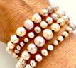 this bracelet is the smaller pearls in the photos. 