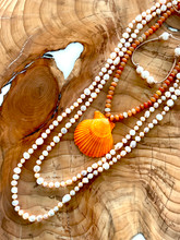Medium Shell with Burnt orange and brass beads