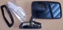 Left or right stainless steel flag mirror with gasket and mounting bracket.  Used on e10, e21's and e9 Coupes