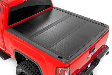 2014-2018 Chevy & GMC Silverado/Sierra 1500 65" Low Profile Hard Tri-Fold Bed Cover - Rough Country 47119551