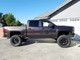 Side View Of James' super clean 2015 Chevy Silverado 1500 Running a McGaughy's Suspension 7-9" Black SS Lif Kit From Mcgaughy's Store set at 9" with rear add a leaf. Sitting on 37x12.50 toyos on 20" Hostile Havocs!