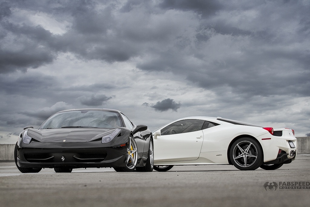 A white and a black Ferrari 458 looking good